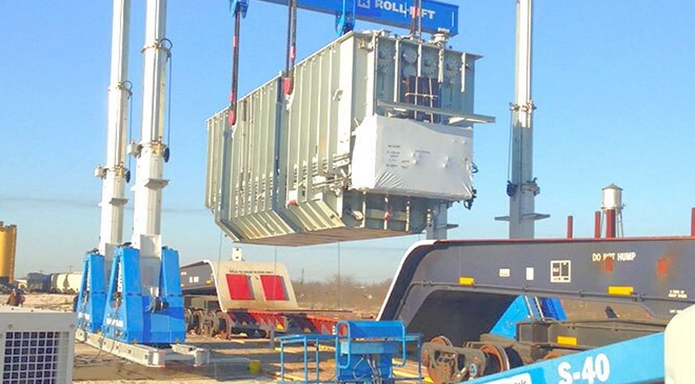 transformer installation moving from a railcar to a truck