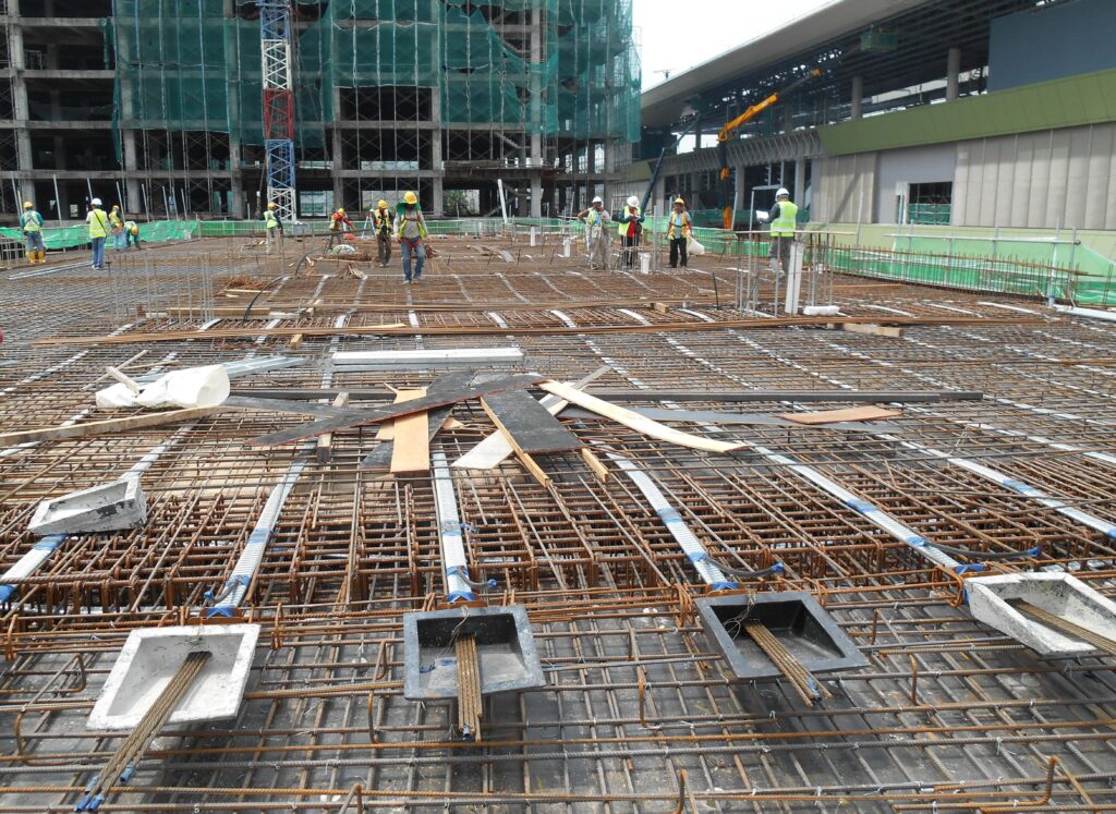 t tensioning a concrete slab for reinforcement